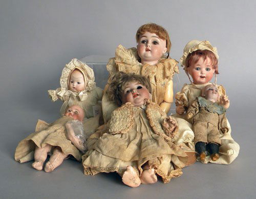 Six porcelain dolls, late 19th c., Simon & Halbi: Six porcelain dolls, late 19th c., Simon & Halbig #126, 10 1/4'' h., Heuback 300-11/0, 10 1/2'' h., Armand Marseille 390, 8'' h., Made in Germany 152, 16'' h., G.K, 7 1/2'' h., A M, 8 3/4'' h.