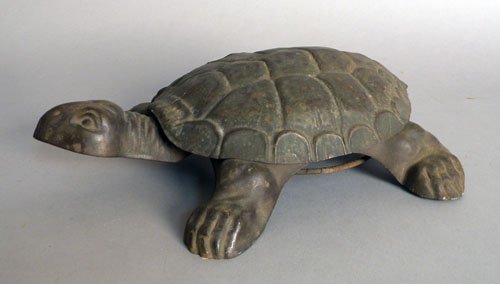 Cast iron and tin mechanical turtle spittoon, lat: Cast iron and tin mechanical turtle spittoon, late 19th/early 20th c., 14'' l.