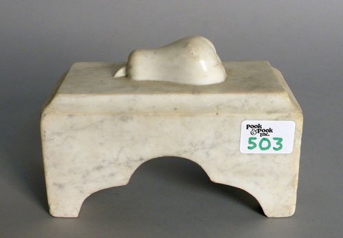 Marble doorstop, 19th c., with a relief carved pe: Marble doorstop, 19th c., with a relief carved pear, 5'' h., 7 1/4'' w.
