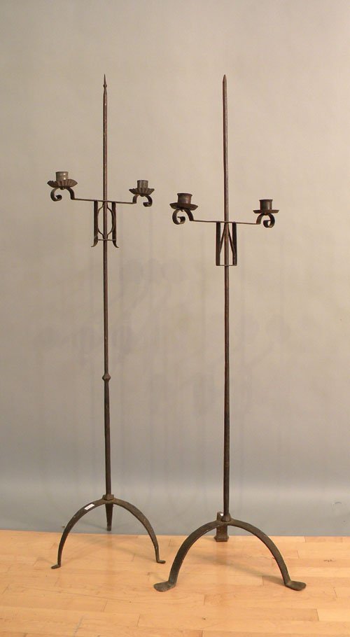 Two I. Marshall reproduction iron candlestands, 6: Two I. Marshall reproduction iron candlestands, 61'' h. and 63'' w.