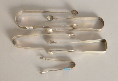 Five American silver sugar tongs marked IC, S. Ki: Five American silver sugar tongs marked IC, S. Kirk (2), LT, and A. Johnston, 6.6 ozt.