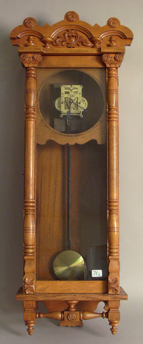 New Haven oak wall clock, 48'' h. Deaccessioned : New Haven oak wall clock, 48'' h. Deaccessioned from the National Watch & Clock Museum, Columbia, Pennsylvania, to benefit the Museum Acquisitions Funds.