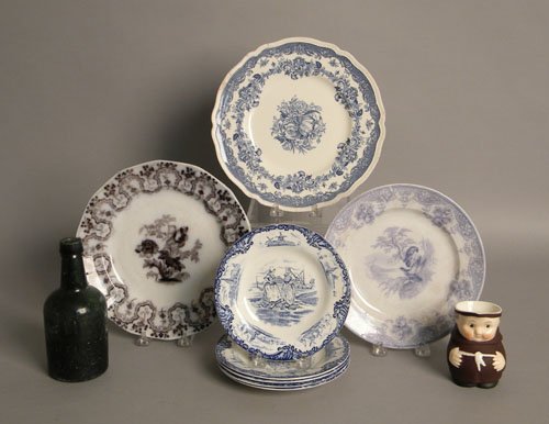 Eight ironstone plates, together with a toby crea: Eight ironstone plates, together with a toby creamer and glass bottle marked 41 South St. Phila.