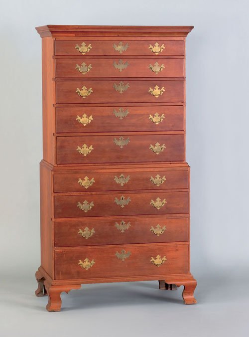 New England Chippendale cherry chest on chest, c: New England Chippendale cherry chest on chest, ca. 1770, with nine drawers and tall ogee bracket feet, 75'' h., 38'' w.