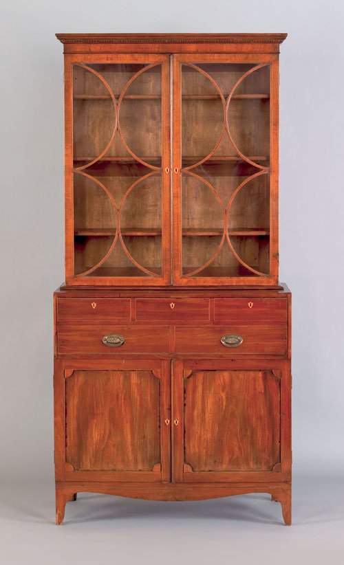 English Hepplewhite mahogany secretary, late 18t: English Hepplewhite mahogany secretary, late 18th c., the dentil molded cornice over two glazed doors with arched mullions, resting on a lower section with butler's desk and two recessed panel doors s