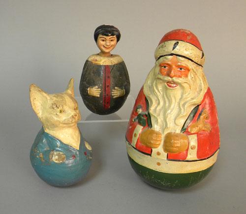 Santa Claus roly-poly figure, 9 1/2'' h., together: Santa Claus roly-poly figure, 9 1/2'' h., together with two others, 6 1/4'' h., 6'' h.