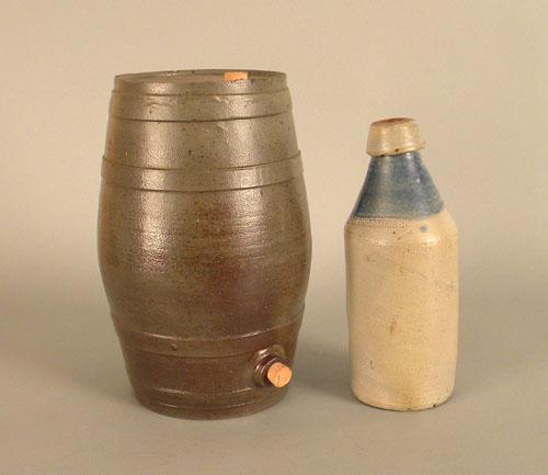 Stoneware bottle impressed P. Pfannebecker, 10'': Stoneware bottle impressed P. Pfannebecker, 10'' h., together with a stoneware keg, 11 1/2'' h.