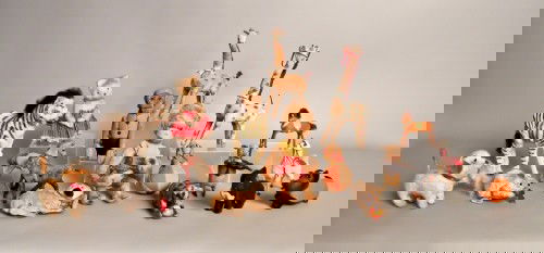 Twelve plush wind up toys, together with a Monkey: Twelve plush wind up toys, together with a Monkey bottle flask, and other plush animals.