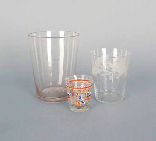 Stiegel type enameled cup, 2 1/2'' h., together wi: Stiegel type enameled cup, 2 1/2'' h., together with two flips, 4 1/4'' h., 5 1/2'' h.