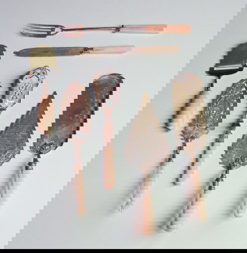 Group of silver plated bone handled serving utens: Group of silver plated bone handled serving utensils.