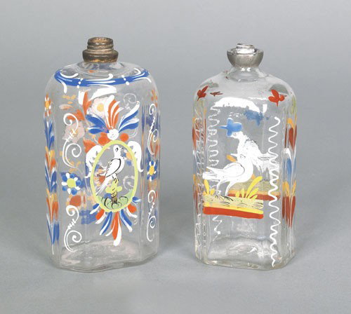 Two Stiegel type glass enamel decorated bottles,: Two Stiegel type glass enamel decorated bottles, ca. 1800, both with bird decoration, 5 1/2'' h.