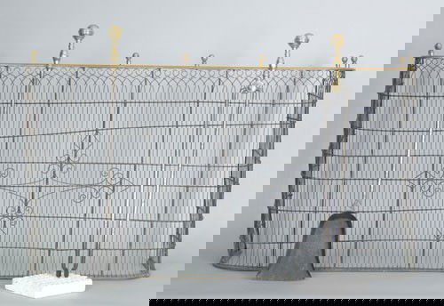 Brass and wire fireplace screen, ca. 1800, with: Brass and wire fireplace screen, ca. 1800, with ball finials and ornate interlacing wire border, 27 1/2'' h., 50'' w., together with matching wrought iron tongs, shovel, and a later tool rest.