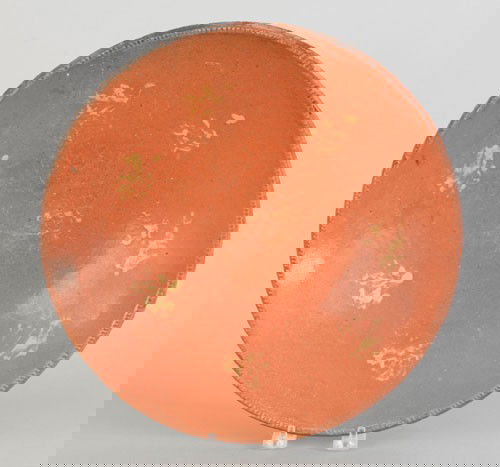 Pennsylvania redware charger, 19th c., with yel: Pennsylvania redware charger, 19th c., with yellow slip splotches, 13 1/4'' dia.