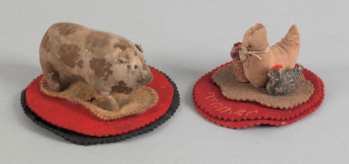 Pig form pen wipe, 19th c., 19th c., 4 1/2'' w.,: Pig form pen wipe, 19th c., 19th c., 4 1/2'' w., together with a hen and chicken pen wipe, 19th c., inscribed Mother, 4 3/4'' w.