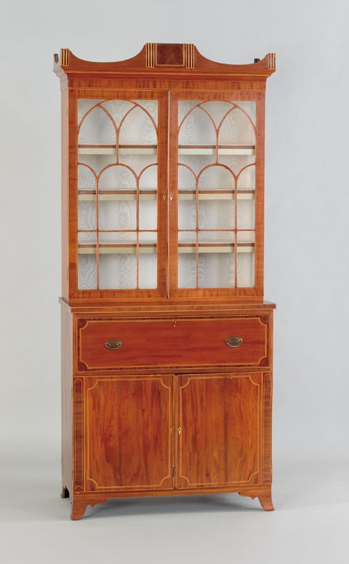 Baltimore Federal mahogany secretary desk, ca. 1: Baltimore Federal mahogany secretary desk, ca. 1800, the upper section with an inlaid pediment cornice above two lattice glazed doors, resting on a base with a butler's desk with satin wood drawers, a