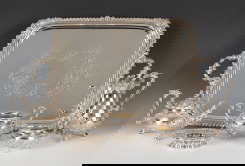 Assembled English five piece silver tea service: Assembled English five piece silver tea service to include a coffee pot, 1827-1828 by Paul Storr, 9'' h., burner, 1829-1830, also by Storr, teapot, 1828-1829 by Pearce & Barrow, creamer, 1816-1817 by