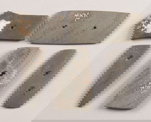 Five slate pendants/gorgets, one tally marked,: Five slate pendants/gorgets, one tally marked, longest - 4 1/4'' l.