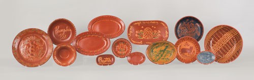 Fourteen pieces of contemporary Ned Foltz redwar: Fourteen pieces of contemporary Ned Foltz redware, largest - 13 1/4'' dia.