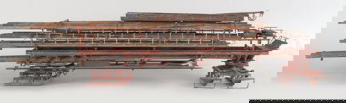Painted metal model of a hook and ladder sled, c: Painted metal model of a hook and ladder sled, ca. 1900, 11'' h., 47'' w.