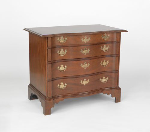 Kittinger mahogany serpentine front chest of draw: Kittinger mahogany serpentine front chest of drawers, 32'' h., 38'' w.