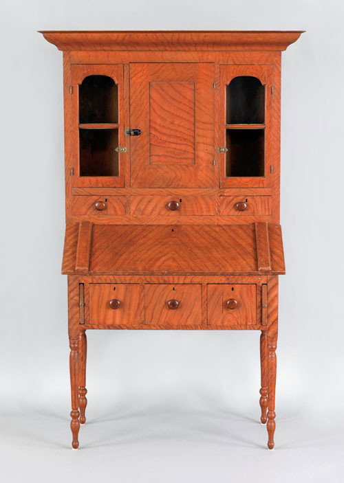 Ohio painted walnut two-part secretary desk, ca.: Ohio painted walnut two-part secretary desk, ca. 1830, retaining an old salmon grained decoration, 82'' h., 43'' w.