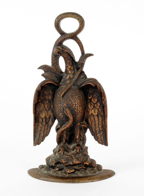 Brass eagle doorstop, late 19th c., 13 1/2'' h.: Brass eagle doorstop, late 19th c., 13 1/2'' h.