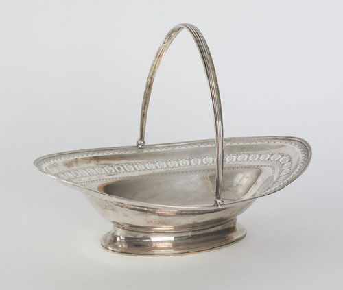 Georgian silver bread basket, 1790-1791, bearin: Georgian silver bread basket, 1790-1791, bearing the touch of Hester Bateman with reticulated and engraved border, 4 3/4'' h., 14 1/4'' dia., 24.2 ozt.