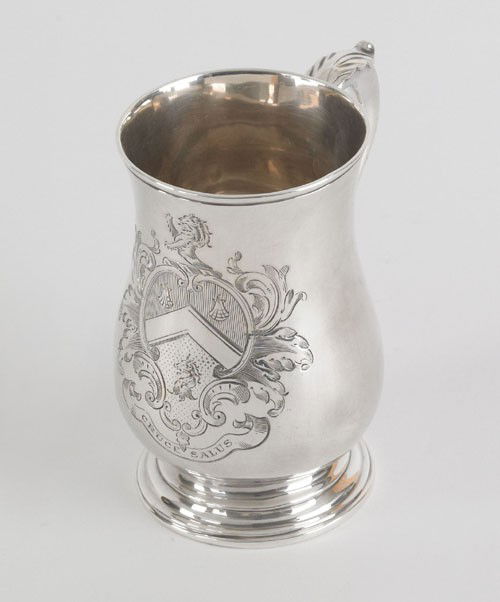 Georgian silver mug, 1778-1779, bearing the tou: Georgian silver mug, 1778-1779, bearing the touch of Hester Bateman with engraved coat of arms, inscribed Cruce Salvs, 4 1/4'' h., 7.9 ozt.