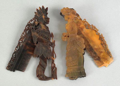 Two Caribbean sailor's carved tortoise shell com: Two Caribbean sailor's carved tortoise shell combs, 19th c. in the form of an Indian and a Victorian lady, 6 3/4'' h., 6 1/2'' h.