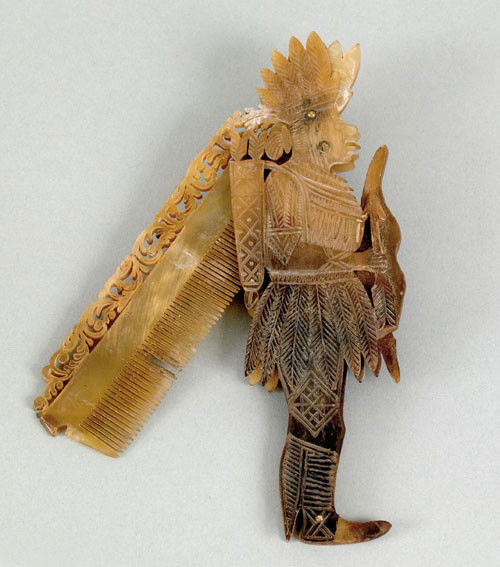 Caribbean sailor's carved tortoise shell comb, 1: Caribbean sailor's carved tortoise shell comb, 19th c. in the form of an Indian, 6 1/2'' h.