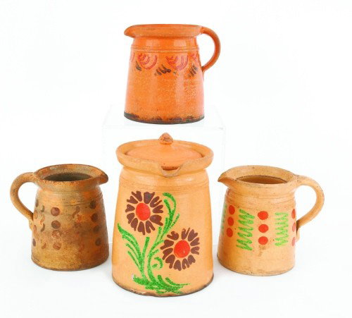 Four French earthenware milk pots, 19th c., talle: Four French earthenware milk pots, 19th c., tallest - 8 1/2'' h.