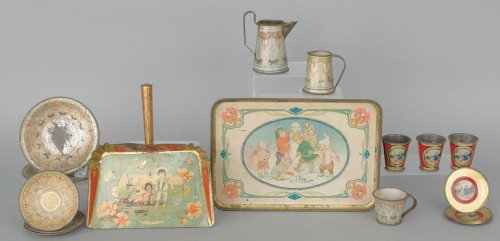 Collection of tin sand toys.: Collection of tin sand toys.