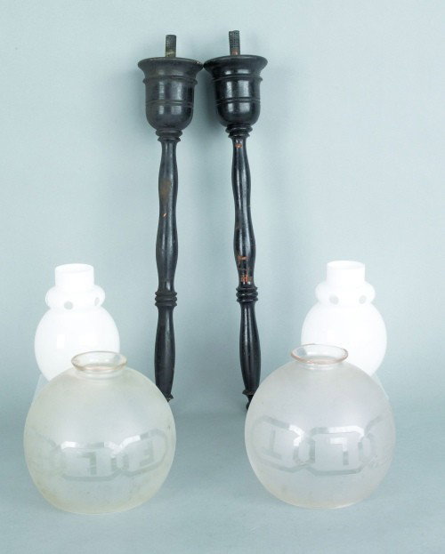 Two turned wooden parade torches, 19th c., 21 1/2: Two turned wooden parade torches, 19th c., 21 1/2'' l., together with two etched lodge shades ''FLT''.