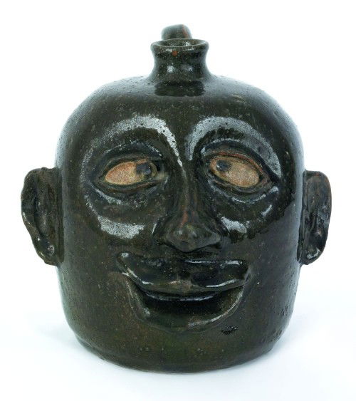 Lanier Meaders redware face jug, 20th c., 8'' h.: Lanier Meaders redware face jug, 20th c., 8'' h.
