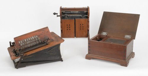 Cylinder music box, together with a harmonette an: Cylinder music box, together with a harmonette and another pump organ.