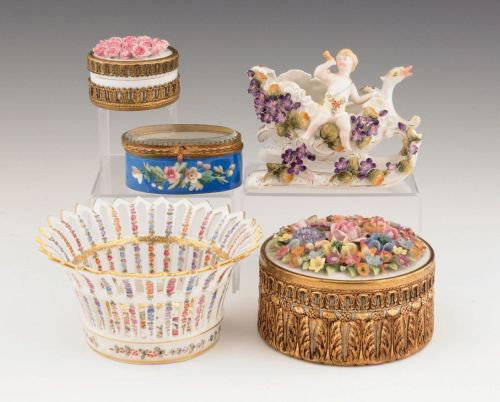 Three ormolu mounted porcelain dresser boxes, tog: Three ormolu mounted porcelain dresser boxes, together with a French reticulated basket, 3'' h., 6'' dia., and a sleigh with putti.