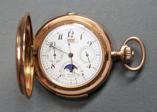 Swiss 25 jewel 14K rose gold quarter repeater ch: Swiss 25 jewel 14K rose gold quarter repeater chronograph pocket watch, ca. 1910, inscribed on face Ed. Peter, Lucerne, with moon phase aperture and month, day, and date calendar with hunter case, ins
