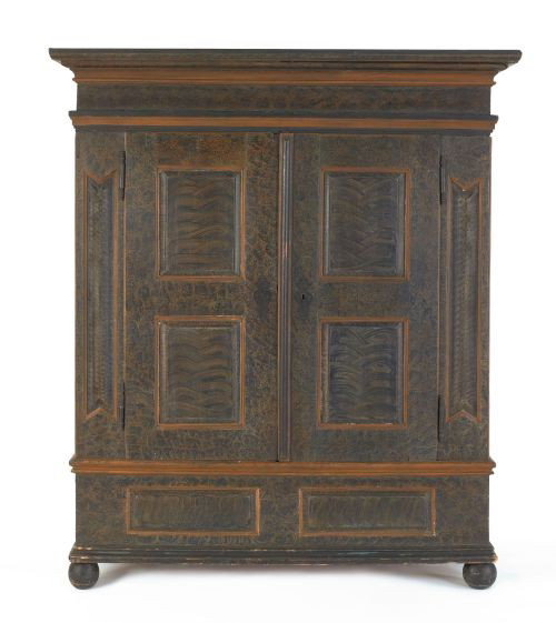 Pine Dutch schrank, late 18th c., having a mold: Pine Dutch schrank, late 18th c., having a molded cornice over two split raised panel doors over a base with two raised panels, all resting on bun feet, retaining a later green and red painted surface