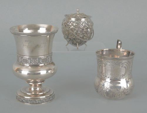 Baltimore silver mustard pot, ca. 1860, by A.E.: Baltimore silver mustard pot, ca. 1860, by A.E. Warner with repousse floral decoration together with an R. & W. Wilson chalice and a New York mug by Ball, Black & Co., 14 ozt., 2 7/8'' h., 5'' h. and 