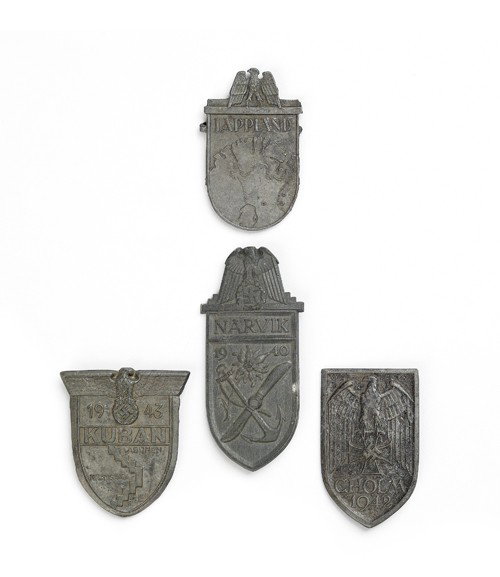 One each of Navik, Kuban, Colum, and Laplord shie: One each of Navik, Kuban, Colum, and Laplord shields.
