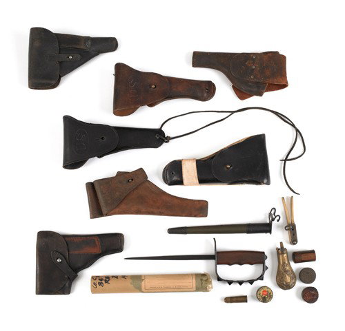 Miscellaneous military items, to include seven le: Miscellaneous military items, to include seven leather holsters, one U.S. WWI trench knife, scabbard, bullet mold, and percussion cap.