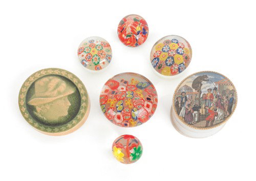 Five miscellaneous paperweights, 20th c., togethe: Five miscellaneous paperweights, 20th c., together with a pottery portrait tile and a porcelain jar with circus scene.