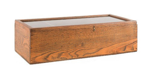 Oak countertop country store showcase, early 20th: Oak countertop country store showcase, early 20th c., 7 1/2'' h., 25 1/2'' w., 11 1/2'' d.