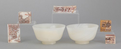 Pair of jade bowls, 2'' h., 3 5/8'' dia., together: Pair of jade bowls, 2'' h., 3 5/8'' dia., together with five soapstone stamps.