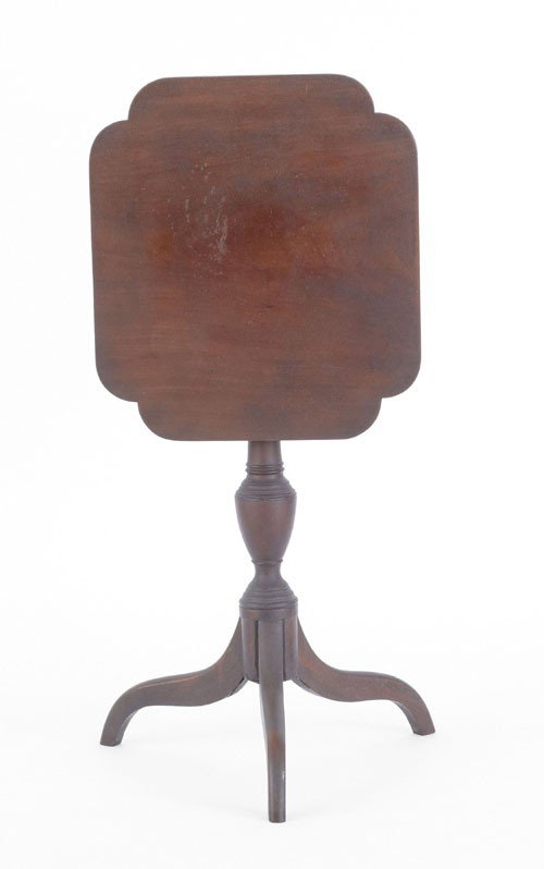 Pennsylvania Federal walnut candlestand, ca. 182: Pennsylvania Federal walnut candlestand, ca. 1820, with a notched corner tilting top and tripod base, 27 1/2'' h., 19 1/4'' w.