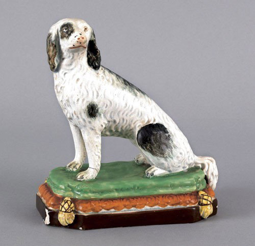 English Staffordshire pearlware figure of seated: English Staffordshire pearlware figure of seated dog, early 19th c., 7'' h.