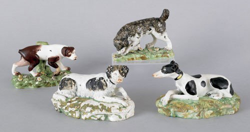 Four Staffordshire pearlware hounds, early 19th: Four Staffordshire pearlware hounds, early 19th c., largest - 4'' h., 6 1/2'' w.