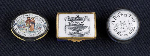 Three Battersea snuff boxes, late 18th c., insc: Three Battersea snuff boxes, late 18th c., inscribed A Pinch of This Deserves a Kiss, A Token of Friendship, How Sweet's the Love That Meets Return, 1 1/2'' l., 1 3/4'' l., and 1 3/4'' l.