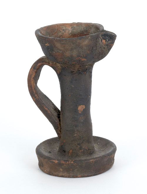 Redware fat lamp, 19th c., with saucer base, 5'': Redware fat lamp, 19th c., with saucer base, 5'' h.