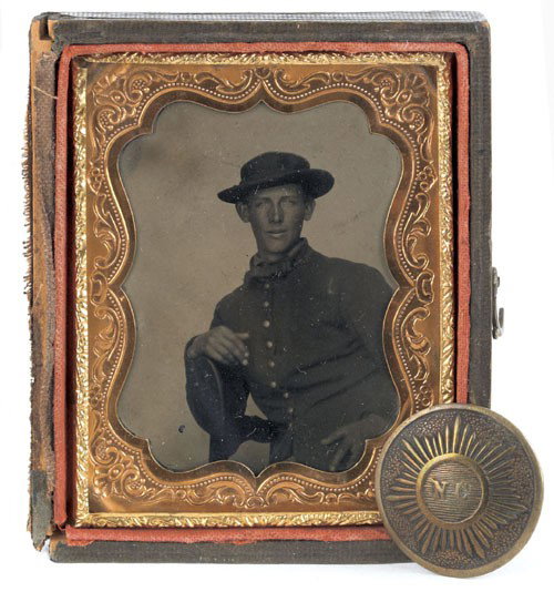 Confederate soldier tin type, identified as Pv: Confederate soldier tin type, identified as Pvt. John Marshal, 41st Regt. N.C.S.T., together with an embossed N.C. button, 2 1/2'' x 2''.